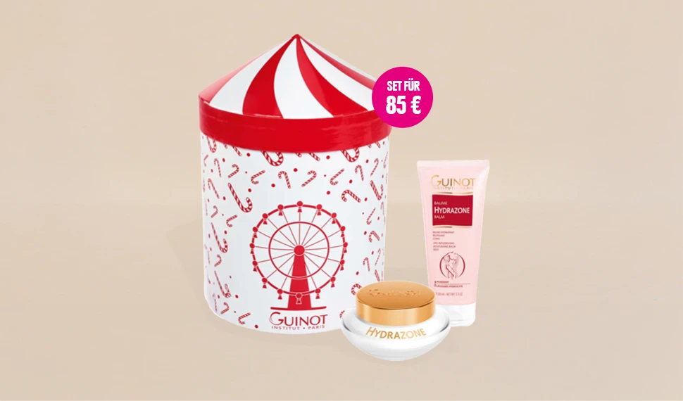 Guinot Hydrazone Balm und Guinot Creme Hydrazone stehen vor einem beigen Hintergrund. Das Set ist reduziert auf 85 €.