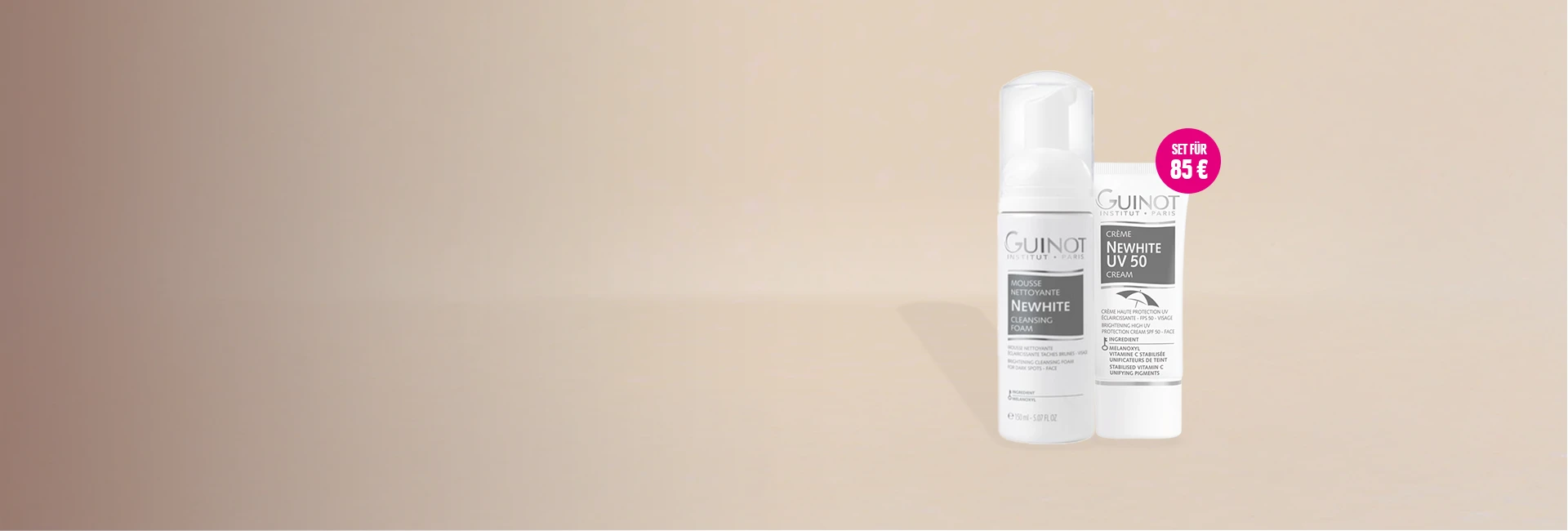Guinot NeWhite Cleansing Foam und NeWhite UV50 stehen vor einem beigen Hintergrund. Das Set ist reduziert auf 85 €.