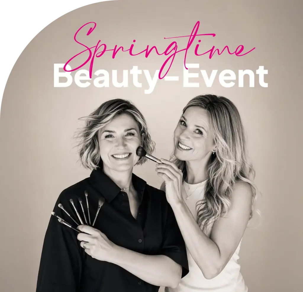 Jasmin Haberl und Julia Schmid posieren lächelnd vor hellem Hintergrund für ein „Springtime Beauty Event“. Eine hält mehrere Make-up-Pinsel in der Hand, während die andere ihr mit einem Pinsel Rouge aufträgt. Oben im Bild steht in pinker und weißer Schrift „Springtime Beauty Event“.